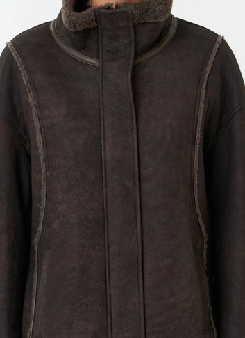 Натуральная дубленка с воротником стойкой фото